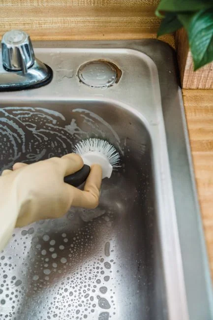 a-person-in-white-gloves-is-cleaning-a-chair-wnudjlnuohu